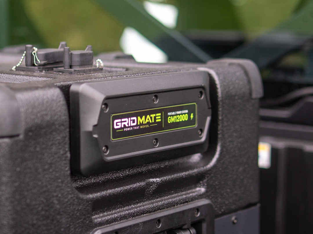 Close-up of the Grid Mate badge on a large power station case